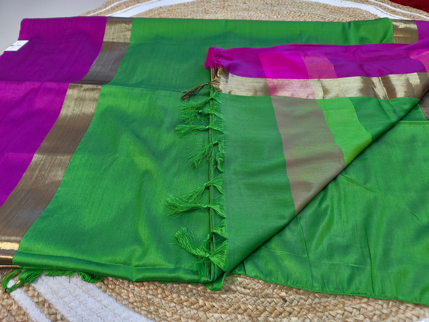 Premium Silk Saree in Green with Rani Pink and Gold Zari Border
